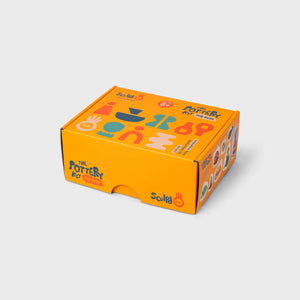 Nuevo kit completo de cerámica Sculpd Kids sobre fondo blanco