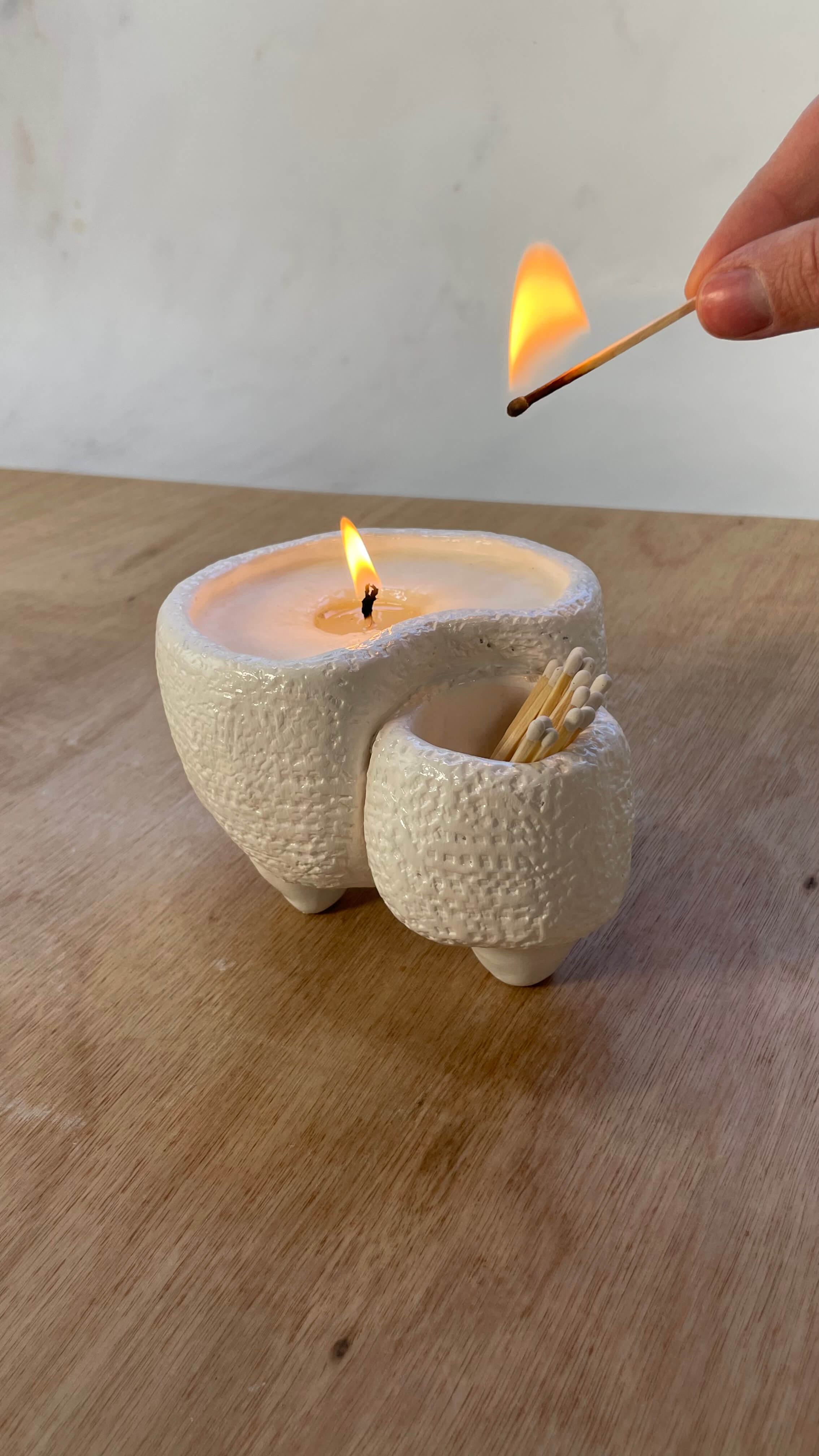 Textured pillar candle with handmade finish
