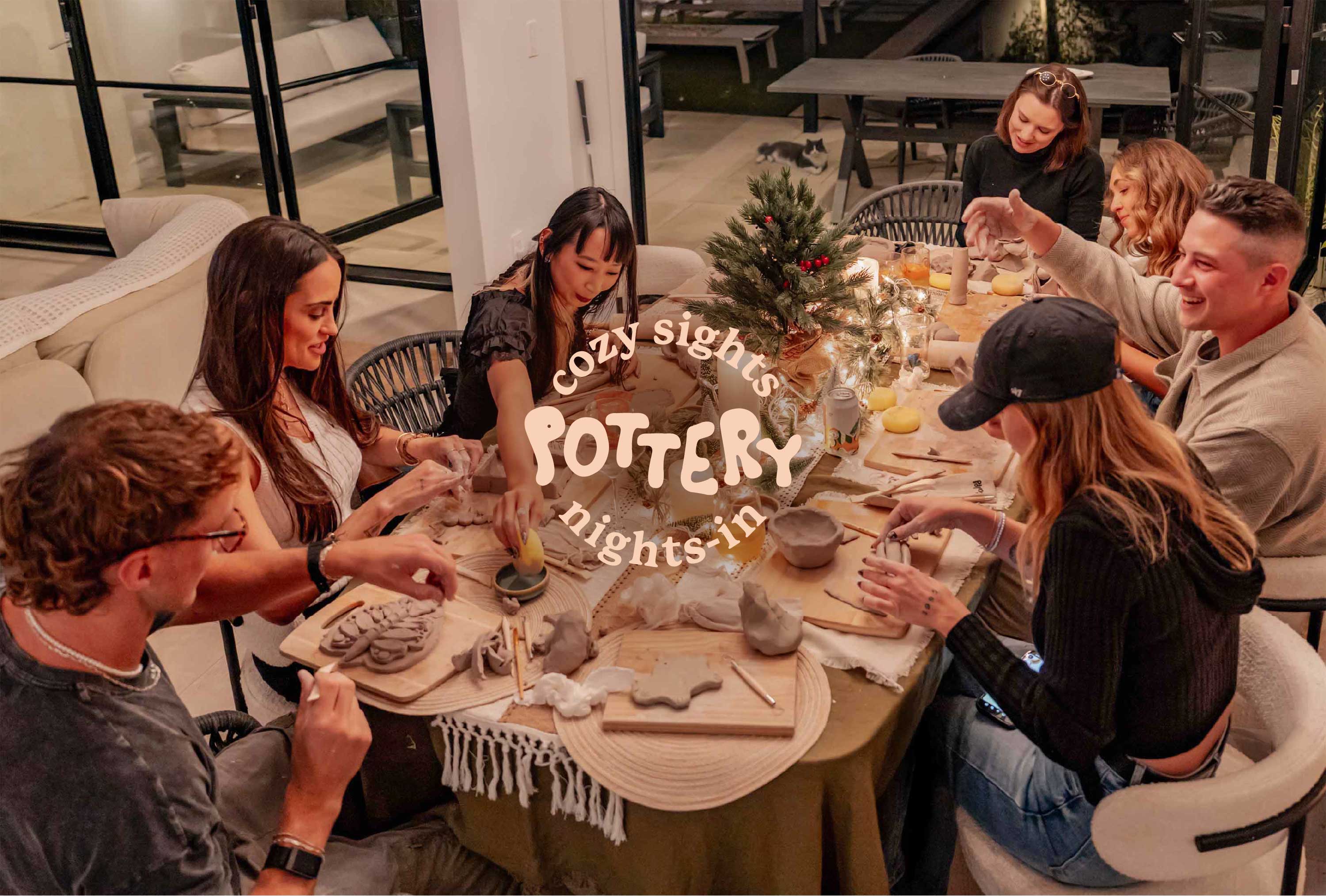Group pottery session featuring friends creating handmade clay pieces at home