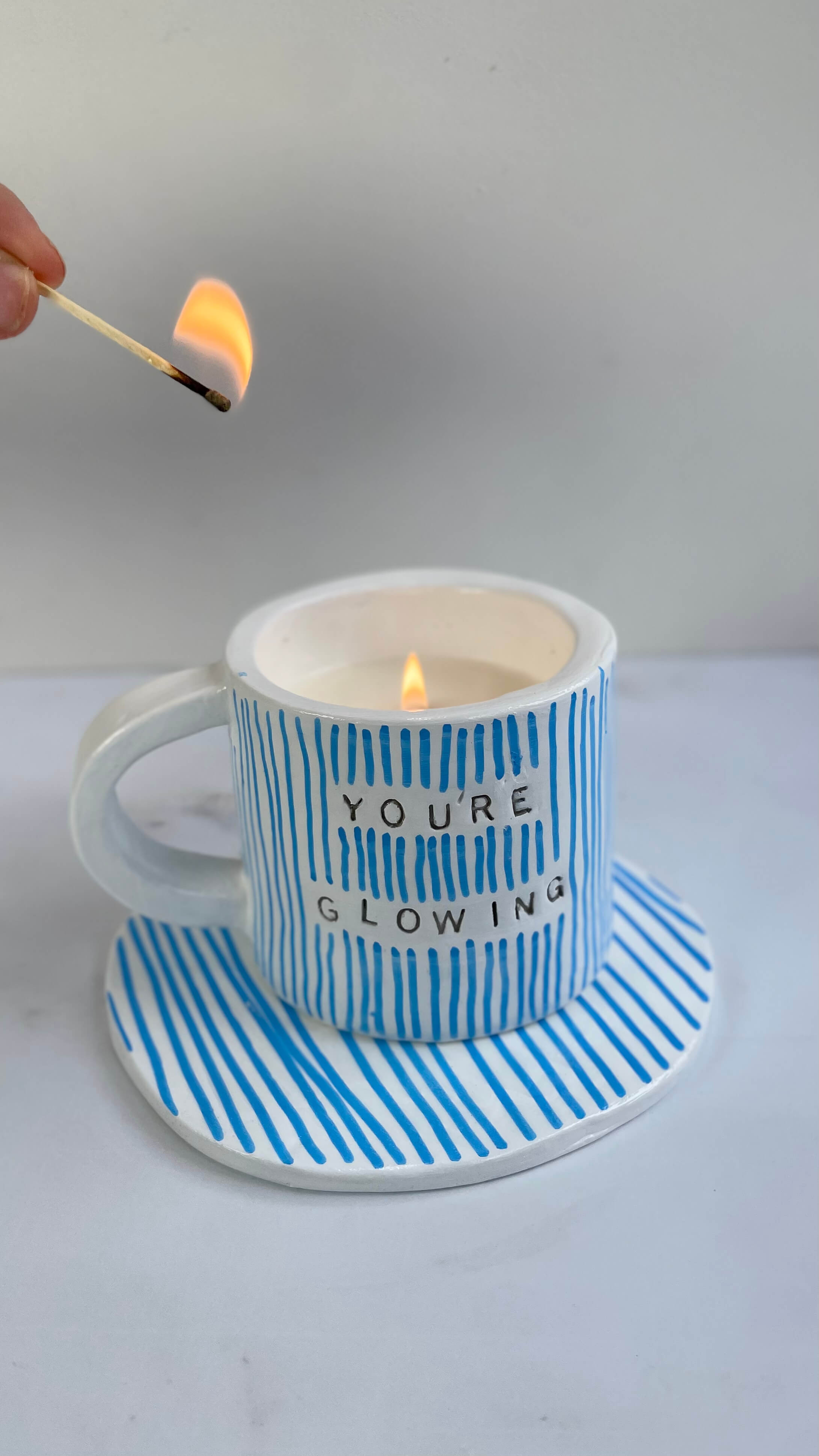 Hand-poured candle in custom 'You're Glowing' mug